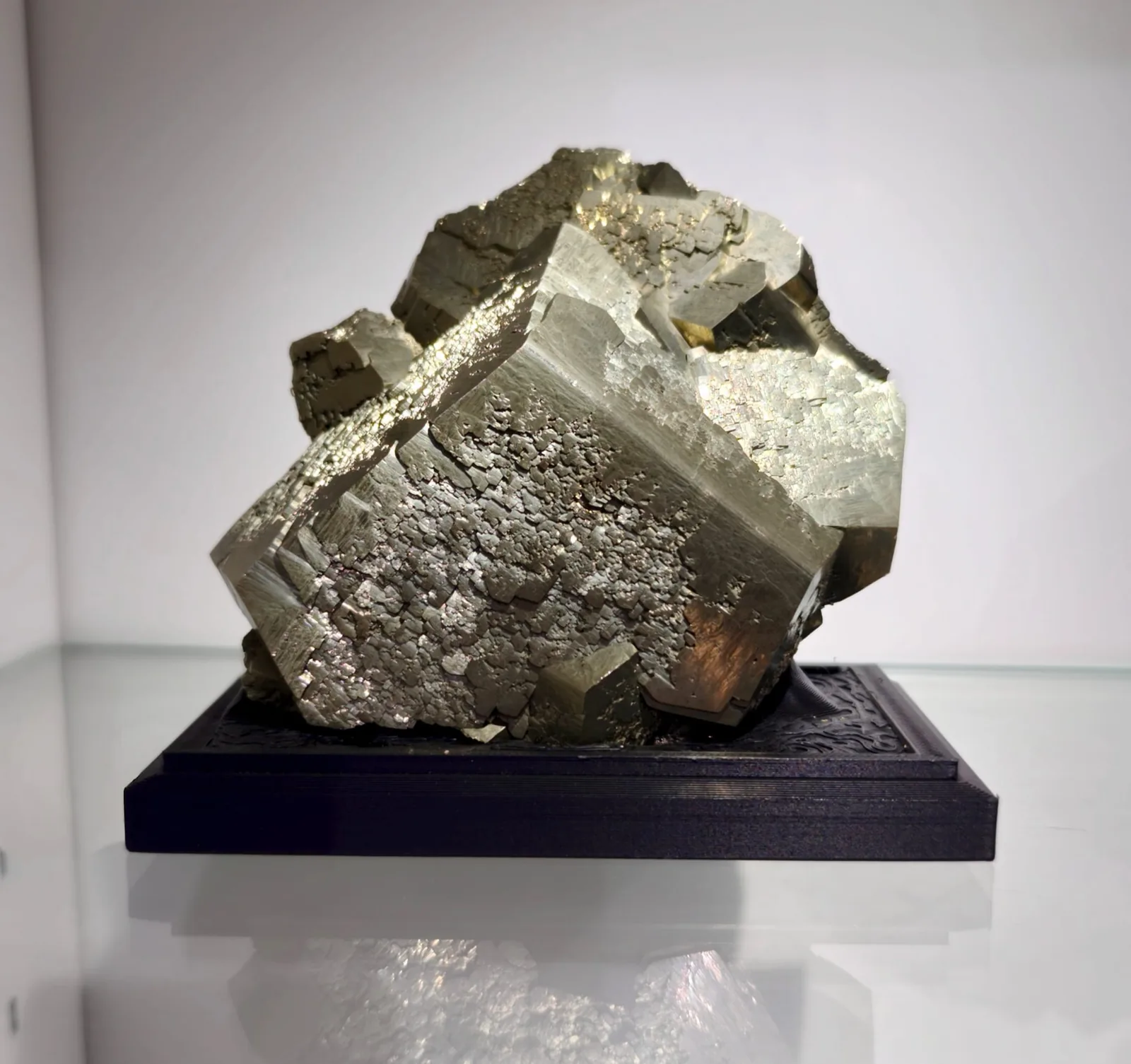 A pyrite specimen seated in its bespoke 3D-printed base — P&L Art and Crystals